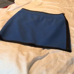 Limed mini skirt with a side zipper